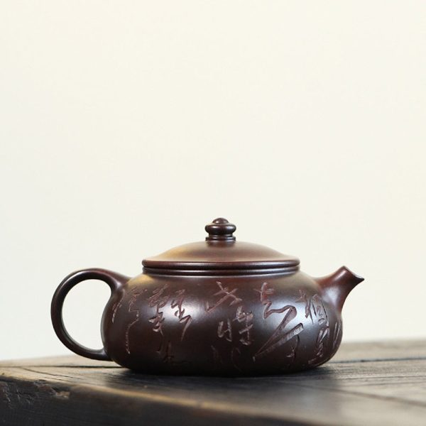 EWXZ005_2 Yixing Purple Clay Calligraphy Carving Teapot