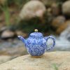 ea2ea2289f9a7c966ffb17b14c1c57d6dcc986e7cded88d387bd76f76591efc2 Premium Hand-Painted Tea Ware • Thousand-Flower Handmade Teapot • Exquisite Hand-Painted with Ball Infuser • Jingdezhen Hand-Painted Blue and White Porcelain