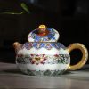 ece1bac39af2ff99259b1e662355ba9da7263649550278449924314e4a657b41 Jingdezhen Exquisite Handmade Hand-Painted Enamel Ruyi Teapot • Pure Gold Detailing • Chinese Porcelain